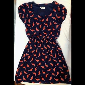 A DINOSAUR DRESS!